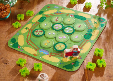 HABA Meine ersten Spiele – Zähl mal! – Spielaufbau mit Bauernhof-Spielplan, Traktor und Kleeblättern
