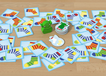 Socken Zocken – ausgebreitete Sockenkarten und gesammelte Paare